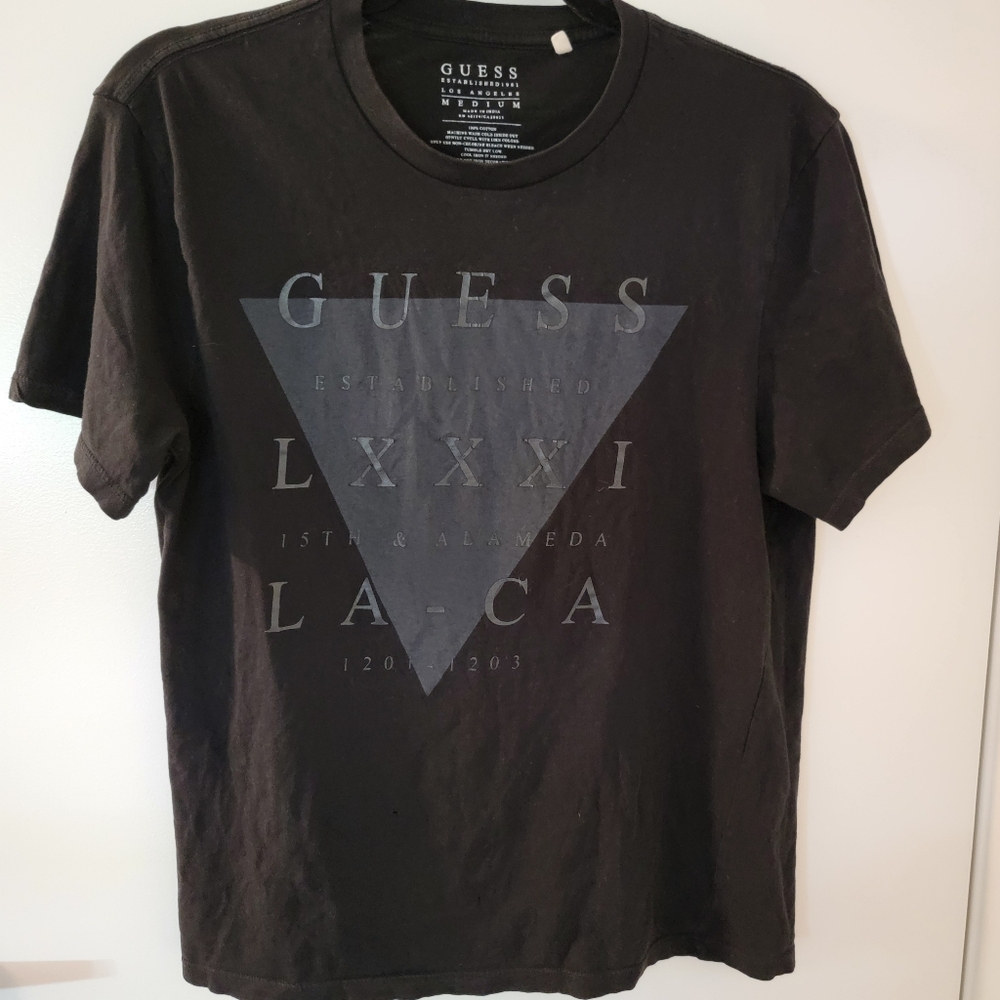 Guess T